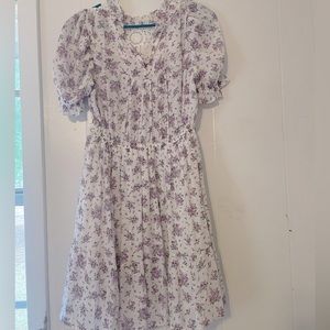 Medium floral dress, no brand name.